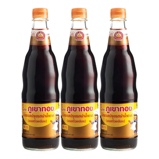Golden Mountain Brown Sauce bottles, 600 ml each, featuring the Golden Mountain brand label and dark savory sauce inside.