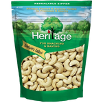 Heritage cashew nuts, confectionery snack in a clear bowl, showcasing roasted, crunchy cashews ready to enjoy.