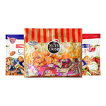 Nezline Nuts Crisp snack in a clear bowl, showcasing crunchy nut-filled confectionery pieces with caramelized coating.