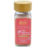 Happy Mate Fine Himalayan Black Salt in a clear jar, showcasing its fine, dark granules for culinary use.