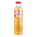 Bottle of Hinode Mirin, Japanese sweet cooking wine, with a clear glass container and Hinode branding on the label.