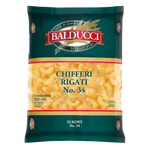 Balducci Chifferi Rigati pasta in a clear bowl, showcasing ridged, short pasta tubes ideal for Italian recipes.