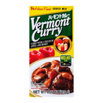 House Vermont Curry Medium Hot 115g dry grocery product, featuring a colorful spice blend for flavorful curry dishes.