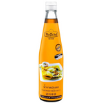 Bottle of Megachef seasoned fish sauce for cooking, with a label featuring the Megachef brand and clear product branding.