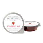 Jar of Beerenberg Strawberry Jam with fresh strawberries and jam spread on toast, showcasing the grocery product.