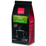 Aroma Espresso Gold drink in a glass cup with a rich, creamy coffee beverage topped with foam and a sprinkle of cocoa powder.