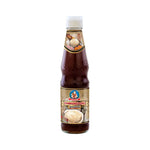 Deksomboon Oyster Sauce Thick 350g bottle, classic dry grocery condiment with rich oyster flavor and glossy dark appearance.