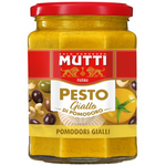 Jar of Mutti Yellow Tomato Pesto with fresh yellow tomatoes and basil, showcasing vibrant ingredients in a grocery product image.