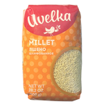 Uvelka Millet in a grocery bag, showing the light-colored grains used for cooking and baking.