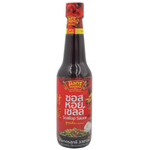 Bottle of Manggon Somboon Scallop Sauce for cooking, featuring the product label and transparent bottle showing the sauce inside.