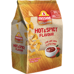 Mission Hot & Spicy Tortilla Chips in a bowl, showcasing their crispy texture and vibrant red seasoning.