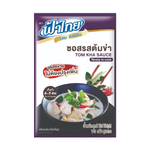Fathai Tom Kha Sauce in a bottle, featuring Thai coconut and herbs, used for making flavorful Tom Kha soup.