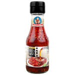 Deksomboon Chili Soy Sauce 125ml bottle from Dry Grocery, with red and black label and soy sauce inside.
