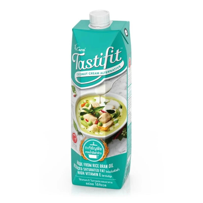 TASTIFIT Grain Coconut Milk carton made from rice bran oil, 1000 ml, cholesterol-free, showing the product packaging.