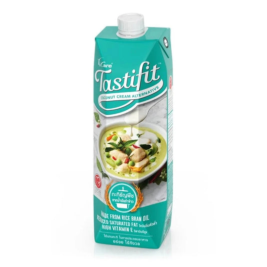 TASTIFIT Grain Coconut Milk carton made from rice bran oil, 1000 ml, cholesterol-free, showing the product packaging.