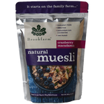 Brookfarm Natural Muesli with cranberries and macadamia nuts in a bowl, showcasing the healthy, crunchy breakfast cereal.
