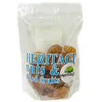 Heritage dried apricots in a clear bowl, showing vibrant orange, chewy confectionery snack on a white background.