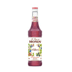 Bottle of MONIN Wildberry Syrup 700ml, a popular dry grocery item with a vibrant berry flavor and colorful label.
