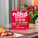 Nakd Berry Delight healthy snack bar with mixed berries and nuts, natural ingredients, and colorful packaging.