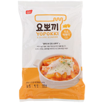 Yopokki Cheese Topokki in a grocery package, showing spicy rice cakes with cheese flavor from the Yopokki brand.