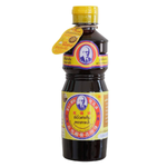 Bottle of Tapae Salted Black Soy Sauce for cooking and flavoring, labeled with the Tapae brand on a grocery shelf.
