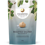 Roasted salted macadamias from Macadamias Australia, close-up of crunchy, golden nut snacks in a bowl.