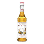 Bottle of MONIN Brown Butter Flavored Syrup in a 700ml plastic bottle, used for flavoring beverages and desserts.