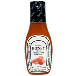 Khewra Thai Himalayan pink salt and honey mix in a grocery bottle, featuring pink salt crystals and honey within a clear container.