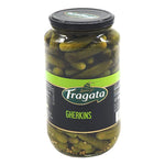 Jar of Fragata Gherkin Pickles in brine, showing fresh, crunchy green gherkins in a clear glass jar for dry grocery shopping.