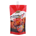 Pure Food Chicken Glazing Sauce in a bottle, ideal for enhancing poultry dishes with rich, savory flavor.