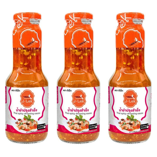 Three bottles of J-LEK Ready-Made Yum Dressing in 370g packs, showing clear labels and caps, ready for use.