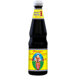 Deksomboon Thin Soy Sauce 600ml bottle, traditional Thai dry grocery condiment with clear dark liquid inside.