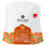 Aroma Caramellow blend drink in a clear glass, showing its rich caramel color and smooth texture.
