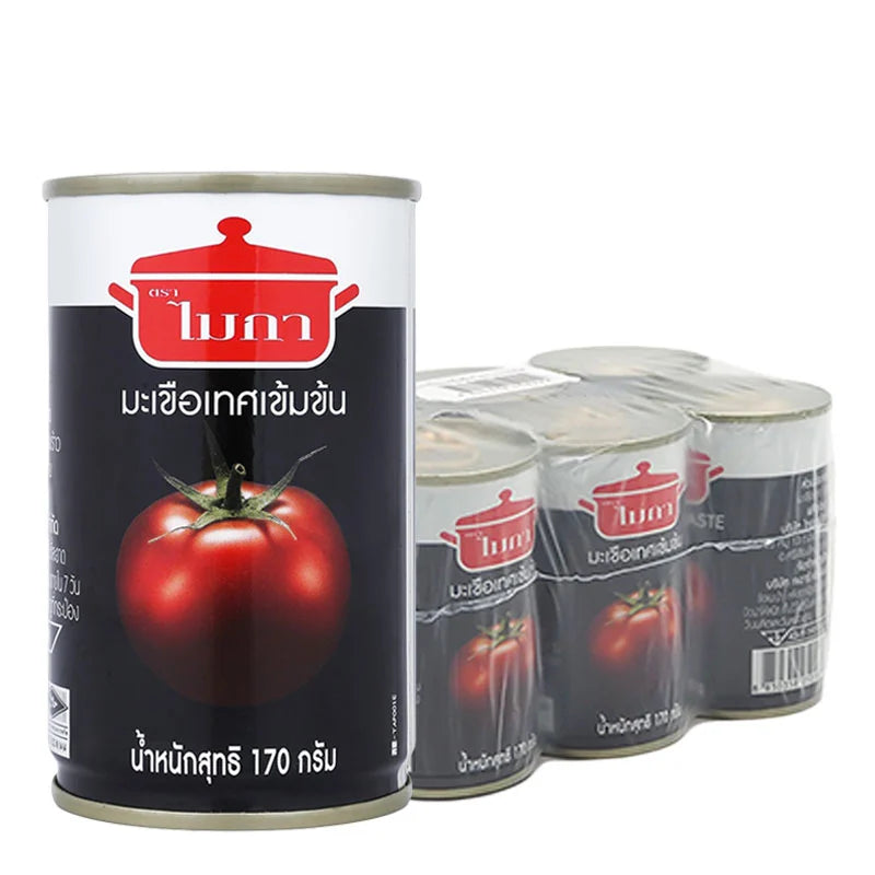 Cans of MICA Tomato Paste 170g, stacked in a row, showcasing the product packaging and branding.