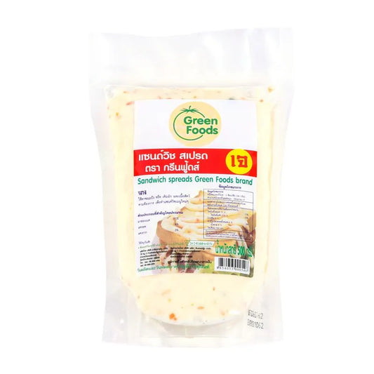 Green Foods Sandwich Spread 500g in a jar, showcasing the vibrant green color and creamy texture of the plant-based spread.