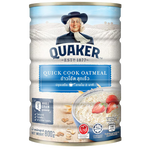Quick Cooking Oatmeal by Quaker in a bowl, showing a serving of prepared oatmeal with a spoon ready to enjoy.