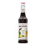 Bottle of MONIN Lemon Tea Syrup 700ml for making lemon tea beverages, with a vibrant lemon and tea leaf design on the label.