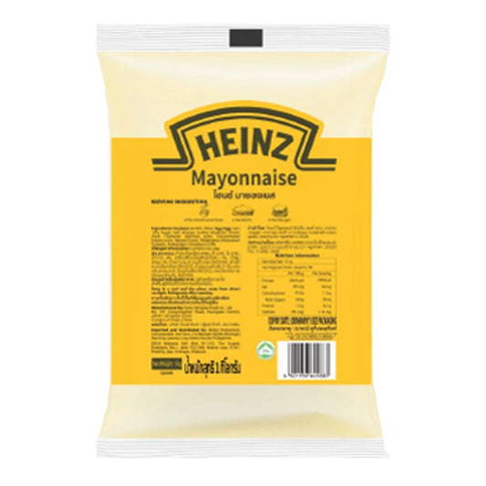 Heinz mayonnaise 1 kg jar with smooth creamy texture and classic white color, ideal for sandwiches and salads.