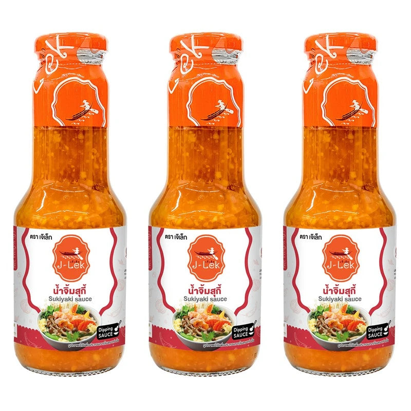 Three 350g glass bottles of J-Lek Suki Sauce, a savory Asian condiment, with clear label and dark sauce inside.