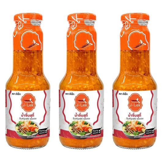 Three 350g glass bottles of J-Lek Suki Sauce, a savory Asian condiment, with clear label and dark sauce inside.