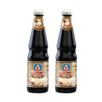 Deksomboon Thick Oyster Sauce 670g jar, popular Thai dry grocery condiment with rich, savory flavor in a glass bottle