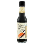 Deksomboon Shoyu soy sauce bottle, 250ml, in its packaging, typical for dry grocery soy sauces from the DEKSOMBOON brand.