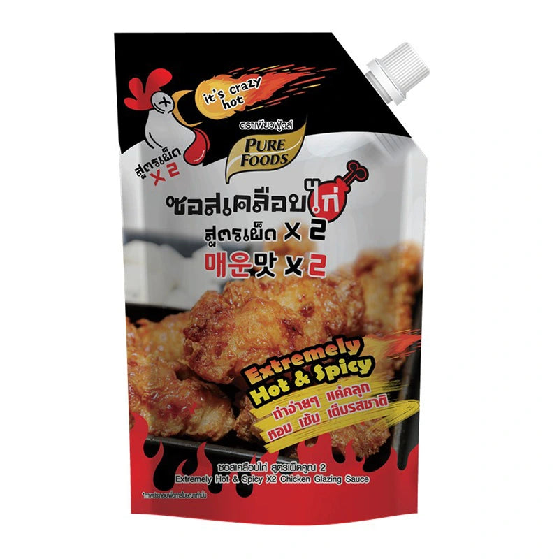 Pure Foods extra hot glazing sauce in a 1 kg bottle, showcasing vibrant red chili peppers and glossy sauce texture.