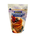 Mcgarrett Instant Pancake Flour 400g in dry grocery section, showing a bag of pancake mix with branding and product details.