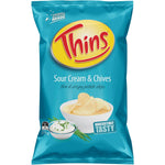 Thins Sour Cream & Chives confectionery snacks in a colorful package with the snack pieces visible inside.