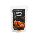 Kurera Orange Mix Himalayan confectionery snacks featuring colorful, citrus-flavored candies in a vibrant mix.
