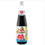 Nguan Cheang Less Sodium 40% Multigrain Soy Sauce bottle with label, showcasing the grocery product on a white background.