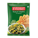 Everest Kasuri Methi dried fenugreek leaves in a clear container, used as a flavorful herb in Indian cooking.