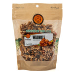 Raw Baboo Walnuts in a bowl, showcasing their natural light brown shells and walnut kernels, from the Baboo grocery brand.