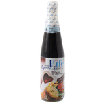 Bottle of Good Life soy sauce for cooking and seasoning, with label showing the Good Life brand and dark soy color.